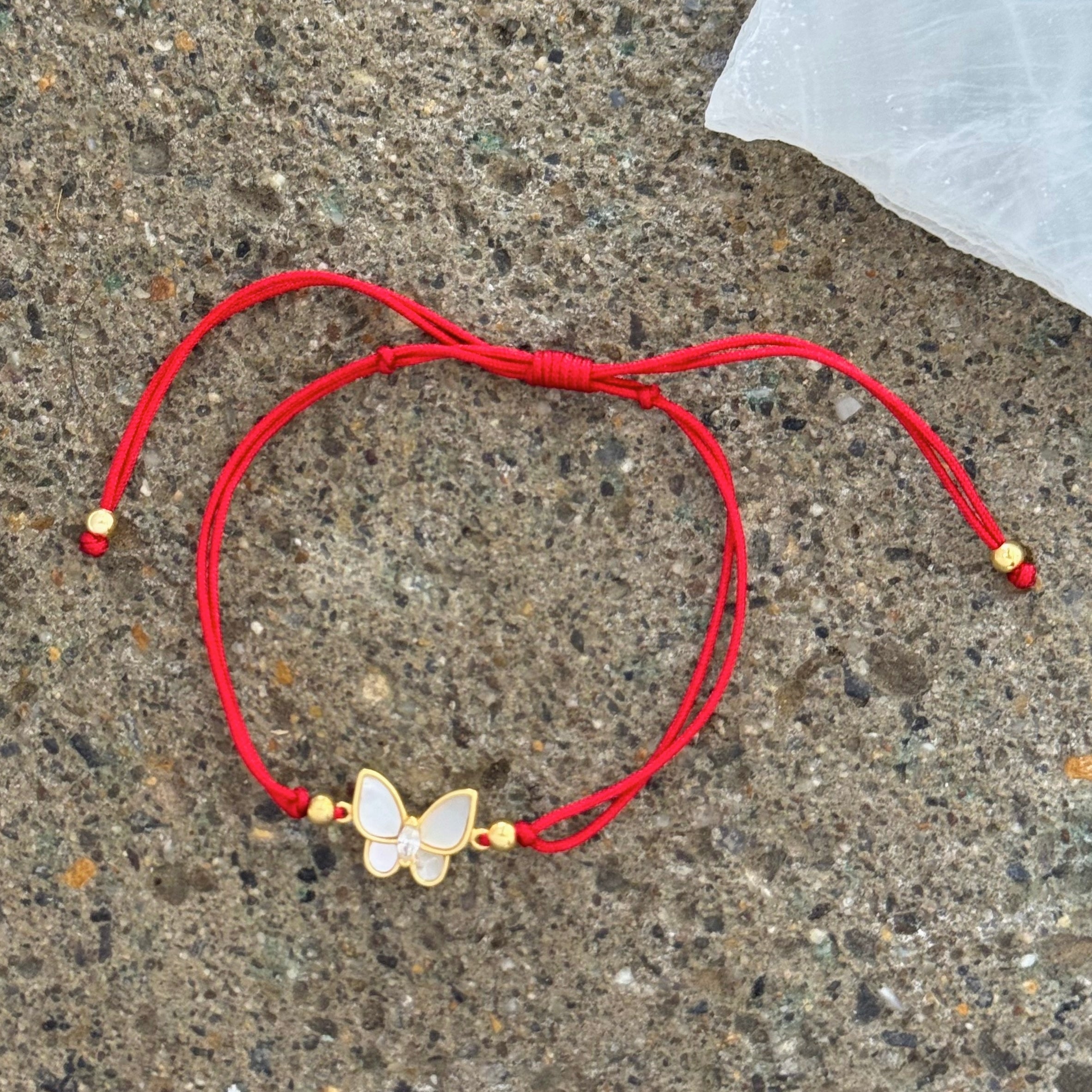 GOLD BUTTERFLY MOTHER OF PEARL RED STRING bracelet