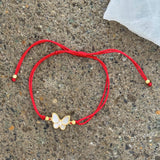 GOLD BUTTERFLY MOTHER OF PEARL RED STRING bracelet