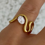 GOLD CRYSTAL OVAL SQUIGGLE STEEL ring