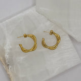 GOLD TWISTED HOOP earrings