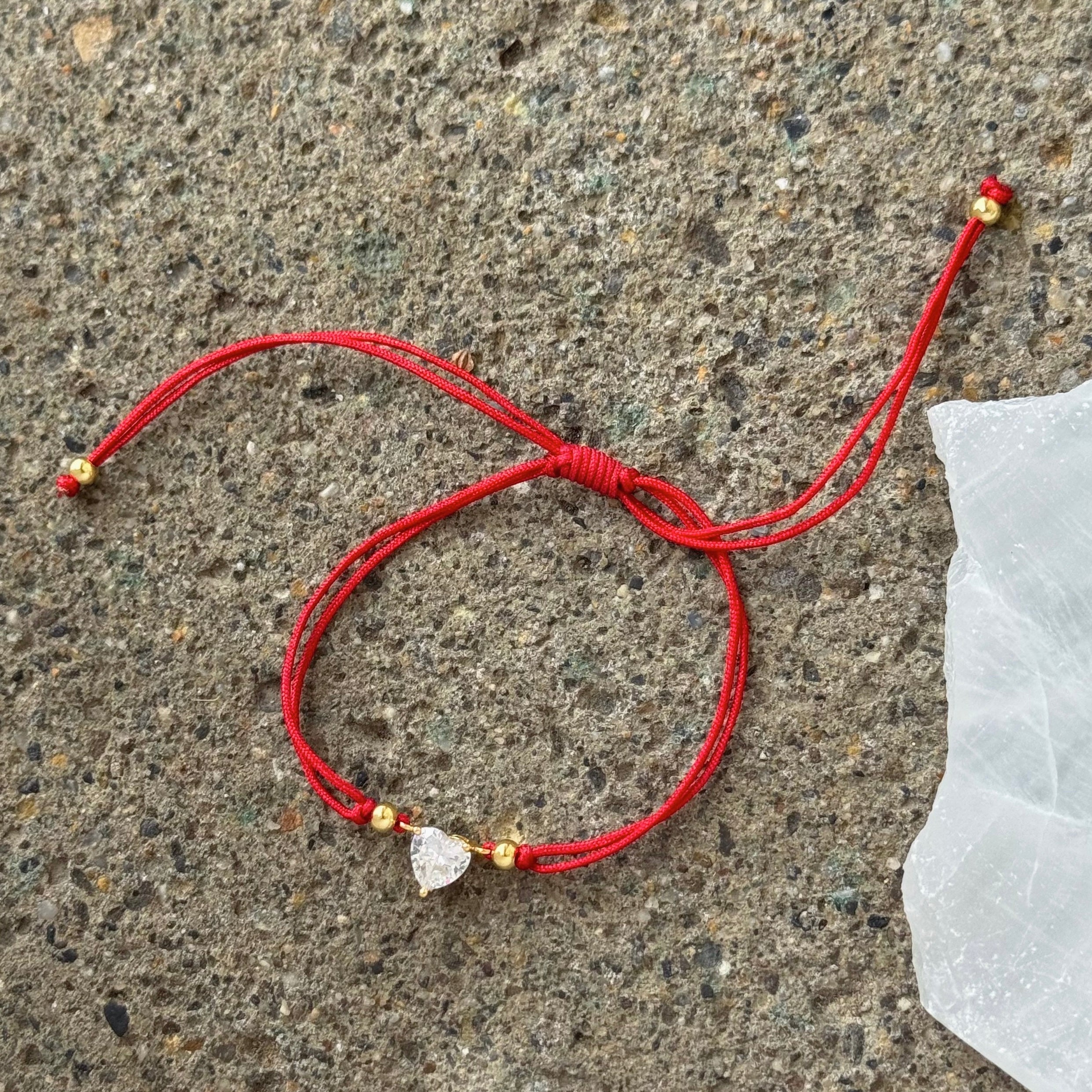 GOLD CRYSTAL HEART RED STRING bracelet