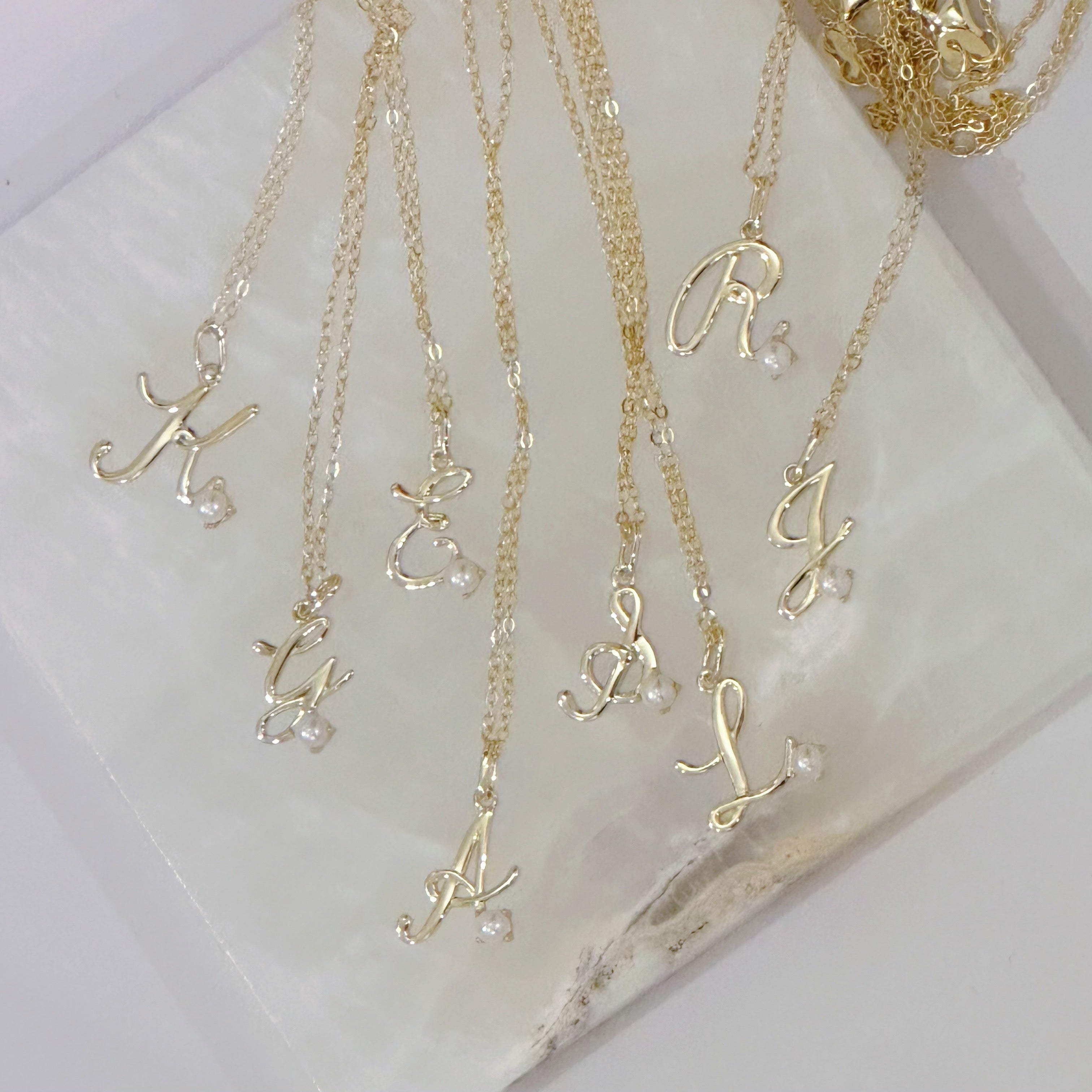 GOLD CURSIVE INITIAL PEARL MINI necklace