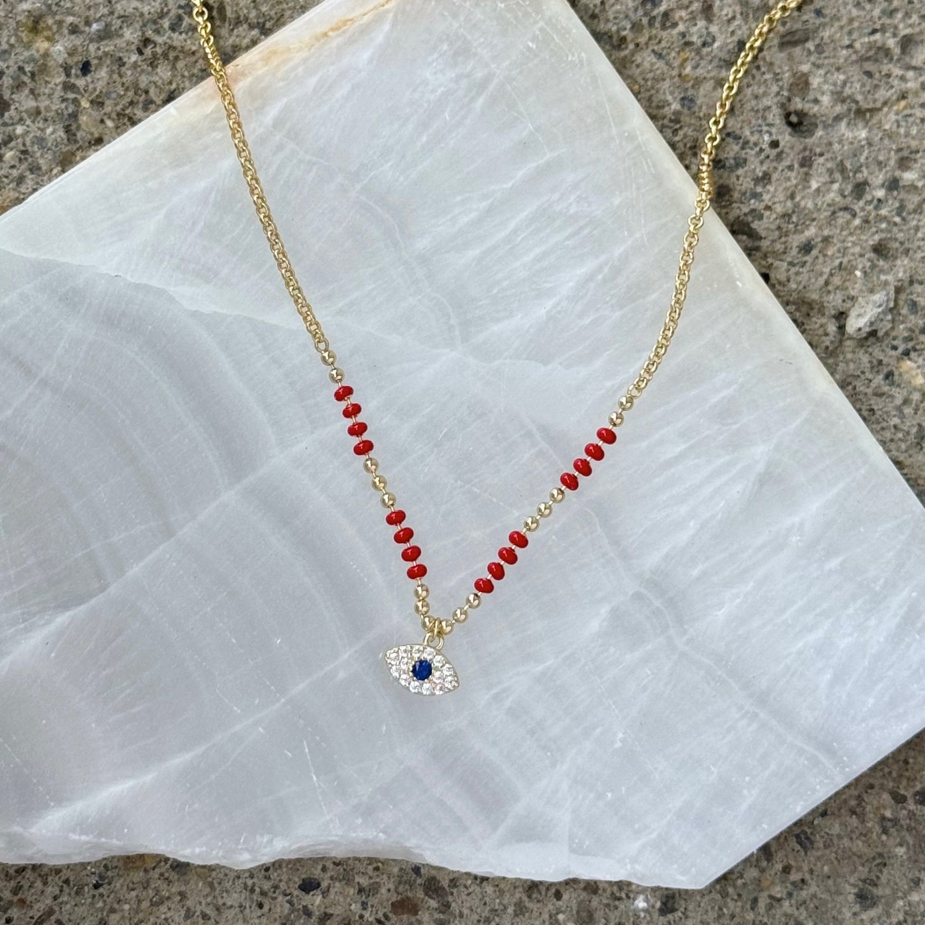 GOLD EVIL EYE II RED BEADED necklace