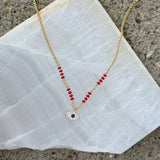 GOLD EVIL EYE II RED BEADED necklace