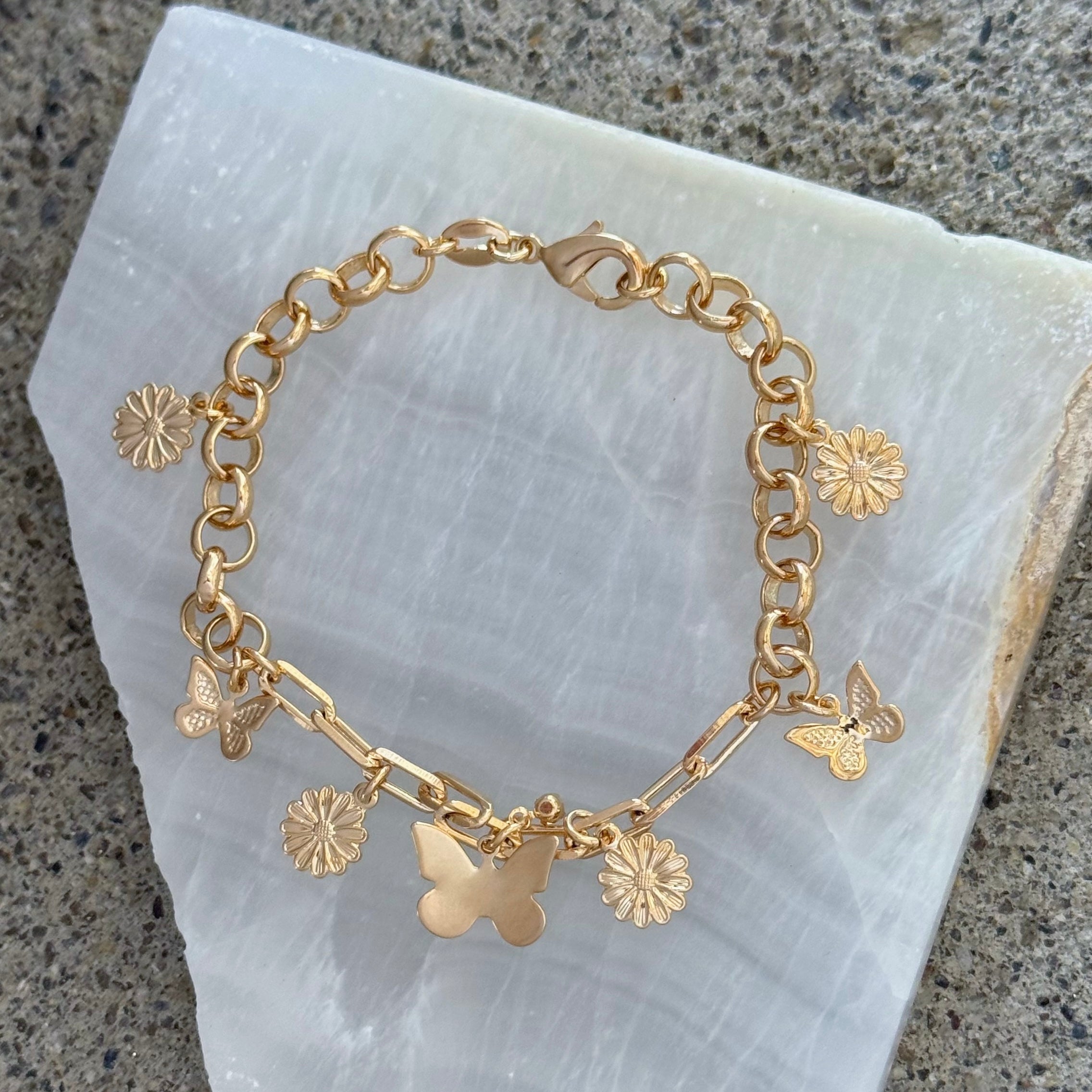 GOLD BUTTERFLY & FLOWER CHARM bracelet