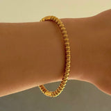 GOLD HIGH POLISHED BEADED bangle