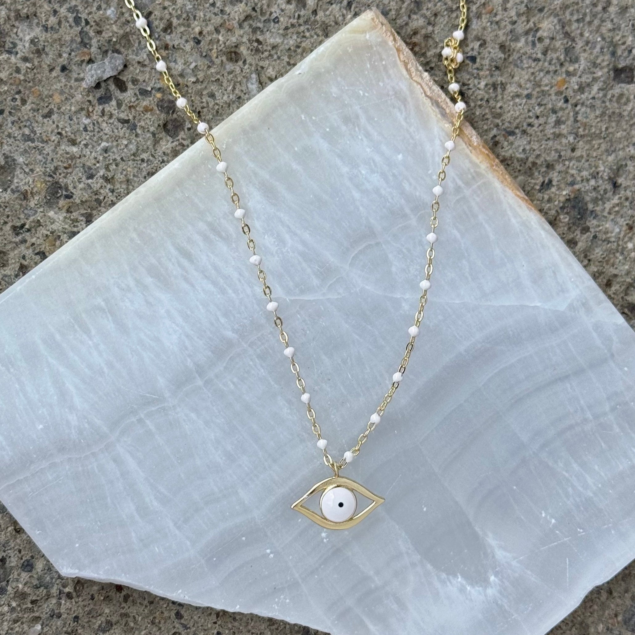 GOLDEN EVIL EYE WHITE BEADED necklace