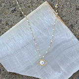 GOLDEN EVIL EYE WHITE BEADED necklace