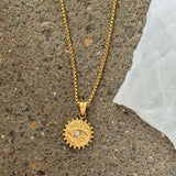 GOLD FLORAL EYE COIN necklace