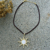 GOLD LARGE LUMINOUS SUN BROWN CHORD necklace