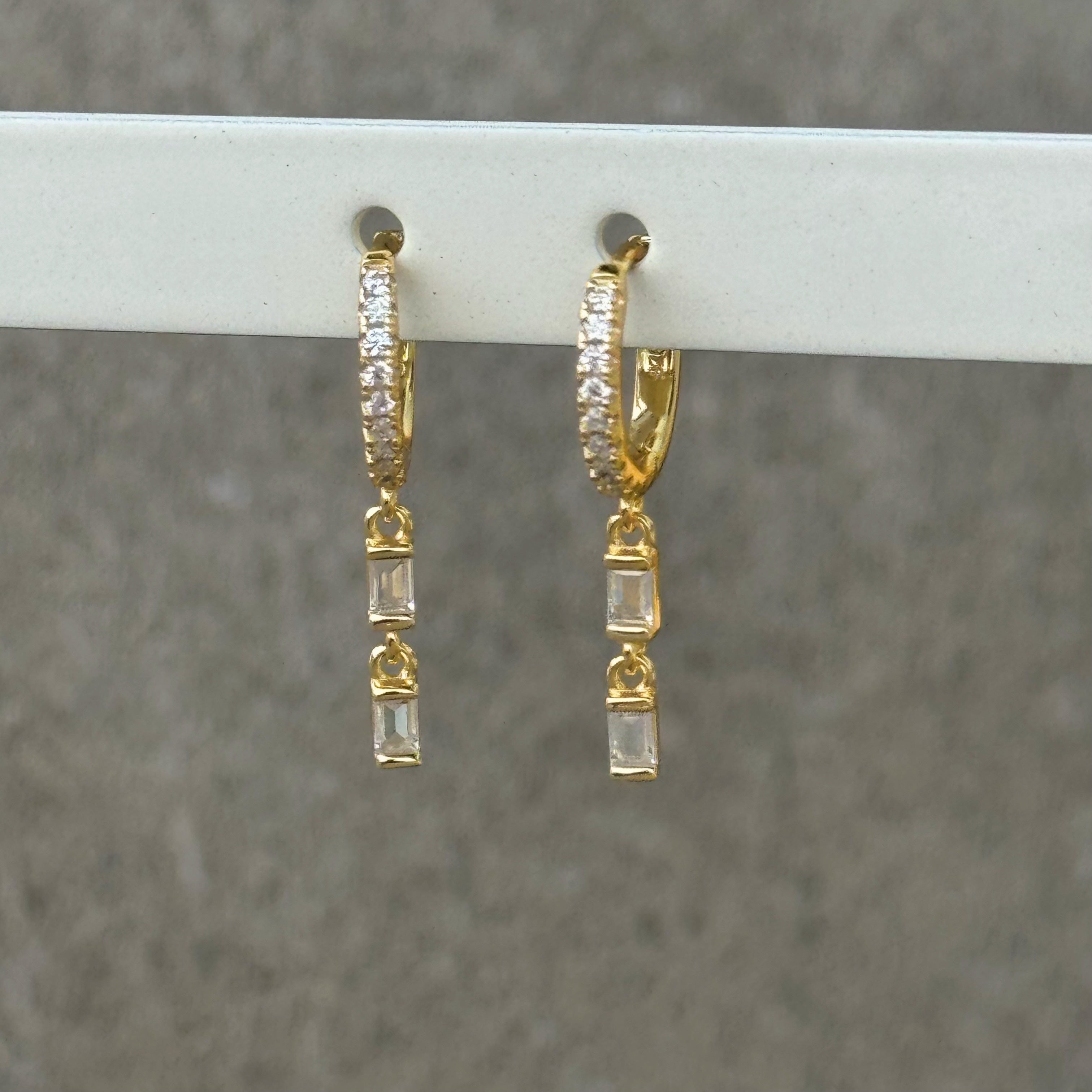 GOLD CRYSTAL BAGUETTE DANGLE HUGGIE earrings