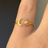 GOLD MOON AND STAR STEEL ring