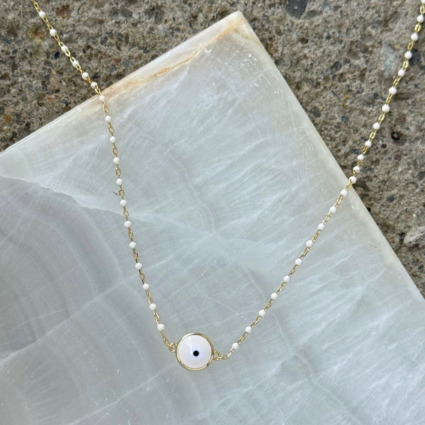GOLD ROUND WHITE EVIL EYE BEADED necklace
