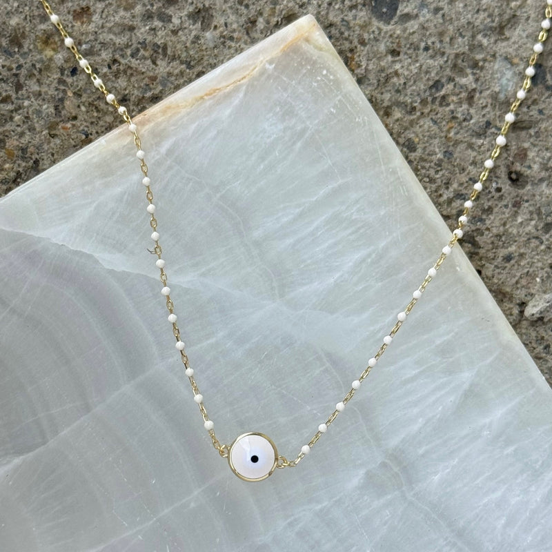 GOLD ROUND WHITE EVIL EYE BEADED necklace