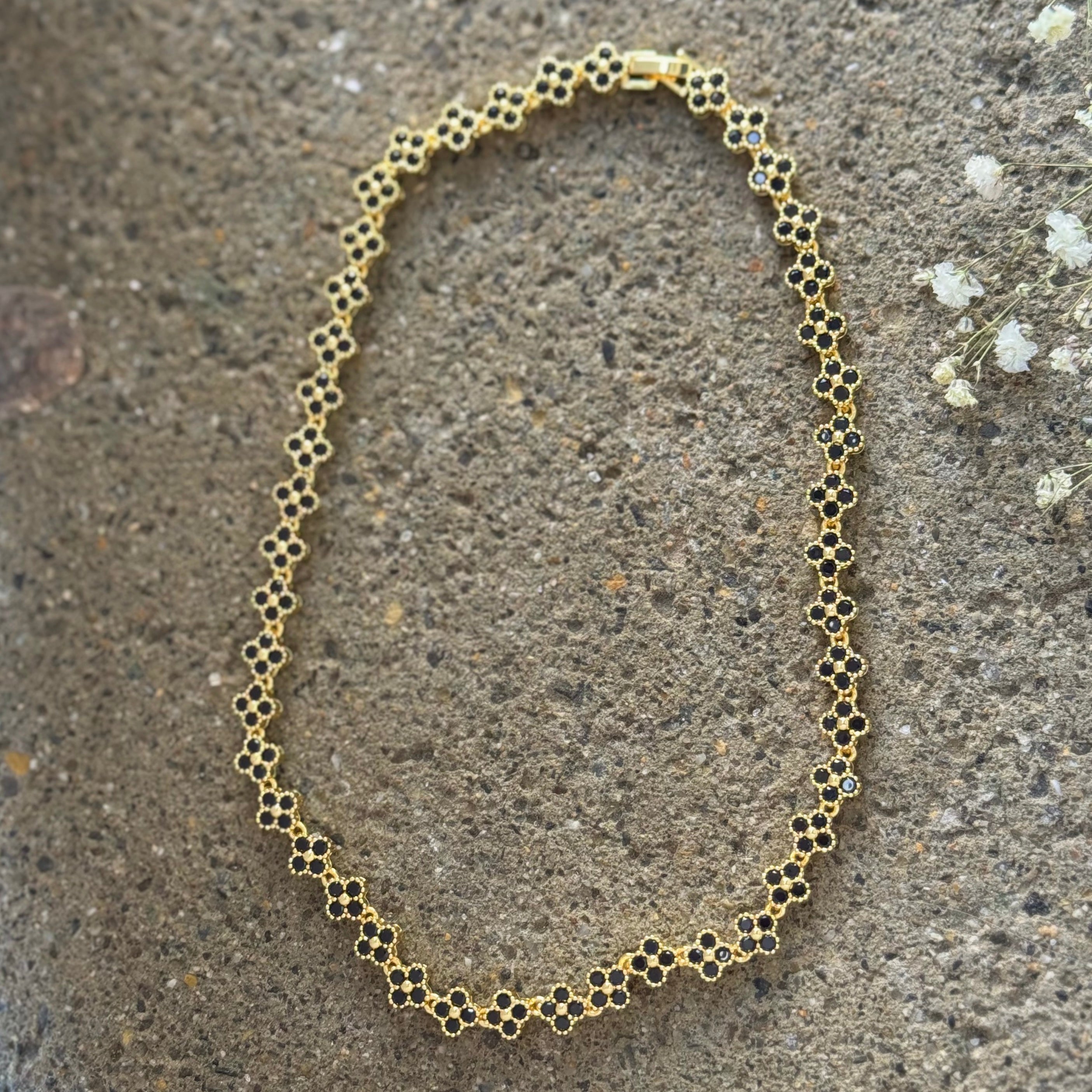 GOLD CRYSTAL BLACK FLORA CLUSTER necklace