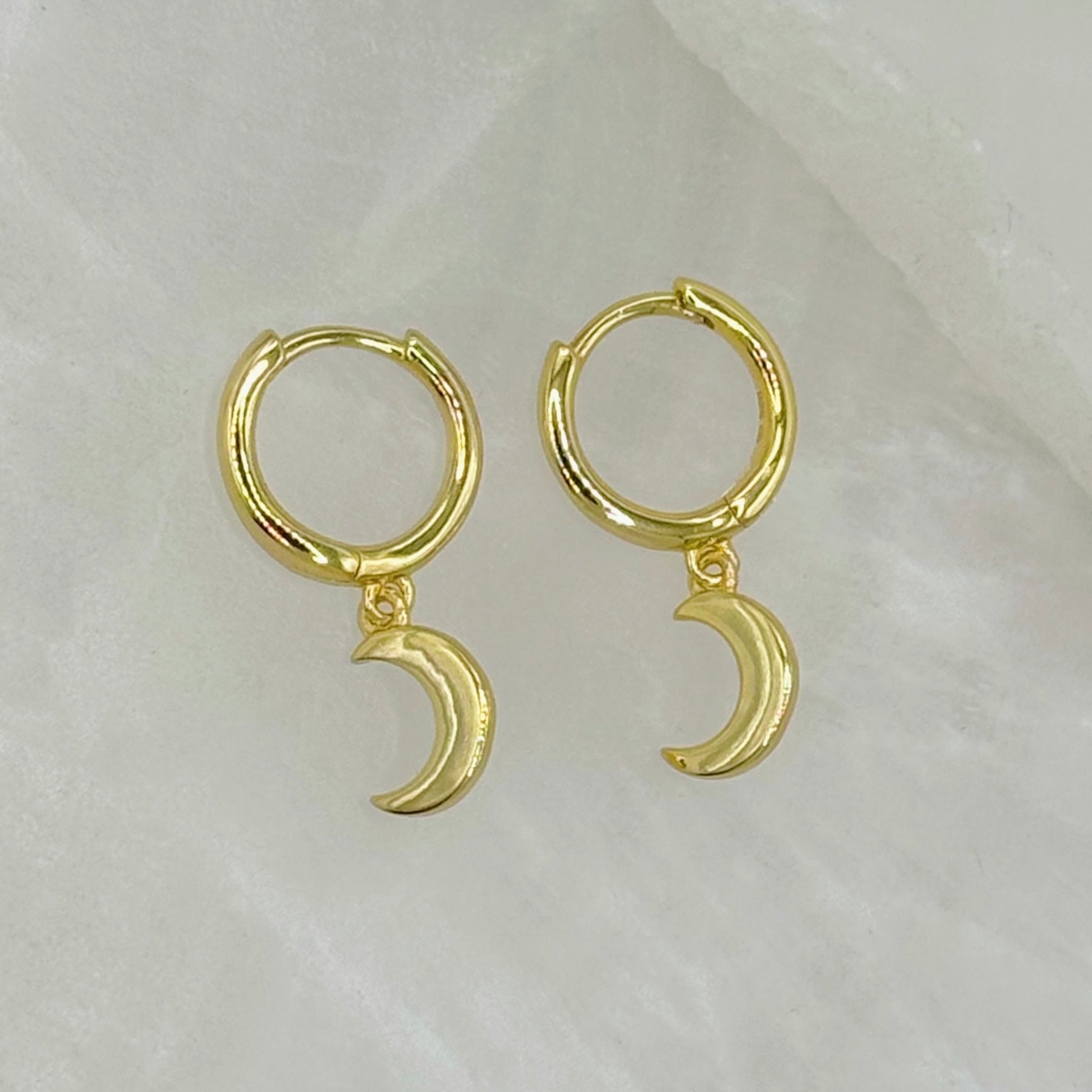 MOON HUGGIE HOOP earrings