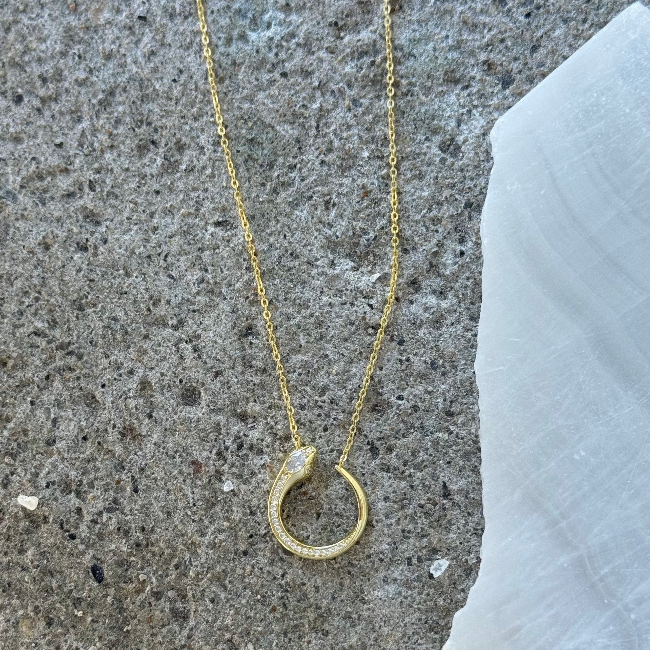 GOLD ROUND CRYSTAL SNAKE necklace