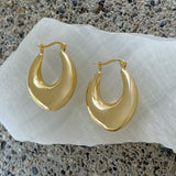 GOLD CELINE TAPERED HOOP earrings