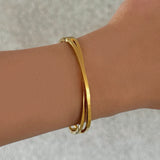 GOLD CRISS CROSS bangle