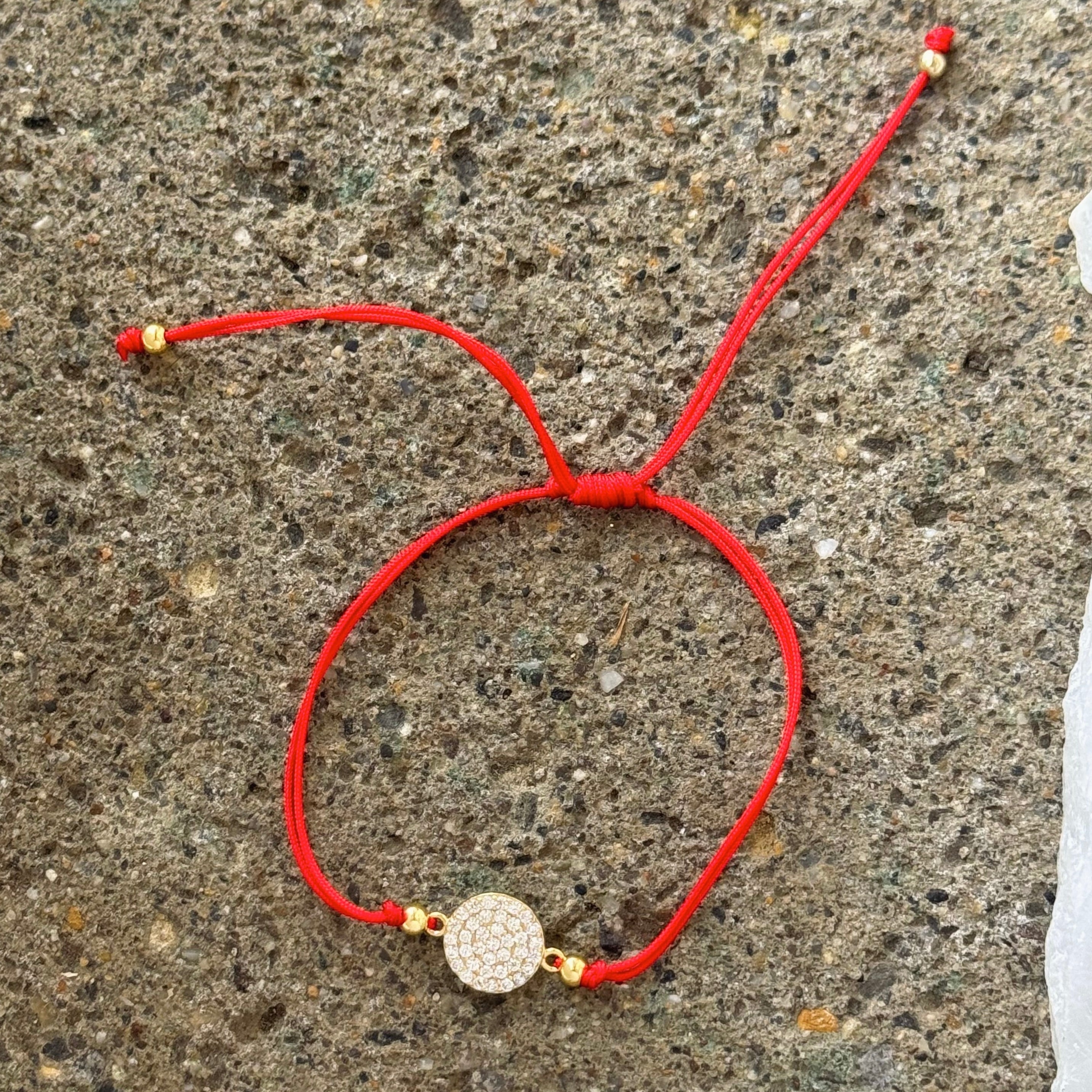 GOLD ROUND PAVE CRYSTAL RED STRING bracelet