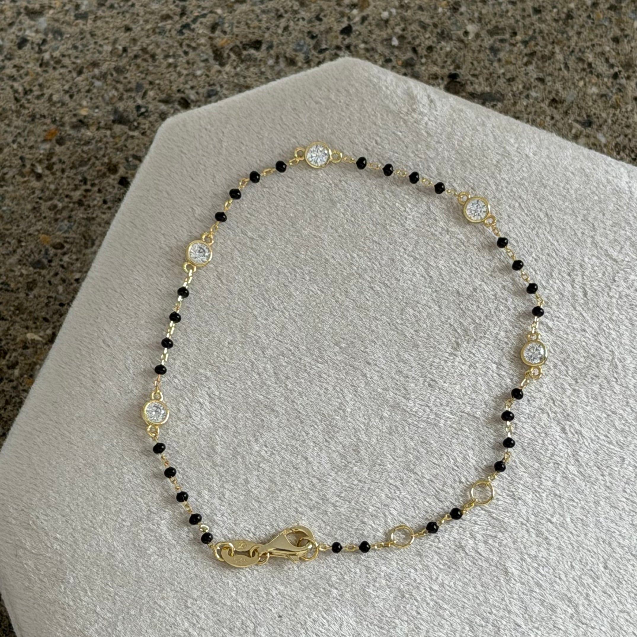 GOLD CRYSTAL BEZEL BLACK BEADED DAINTY bracelet