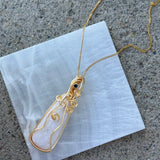 GOLD WHITE QUARTZ SWIRL AMULET necklace