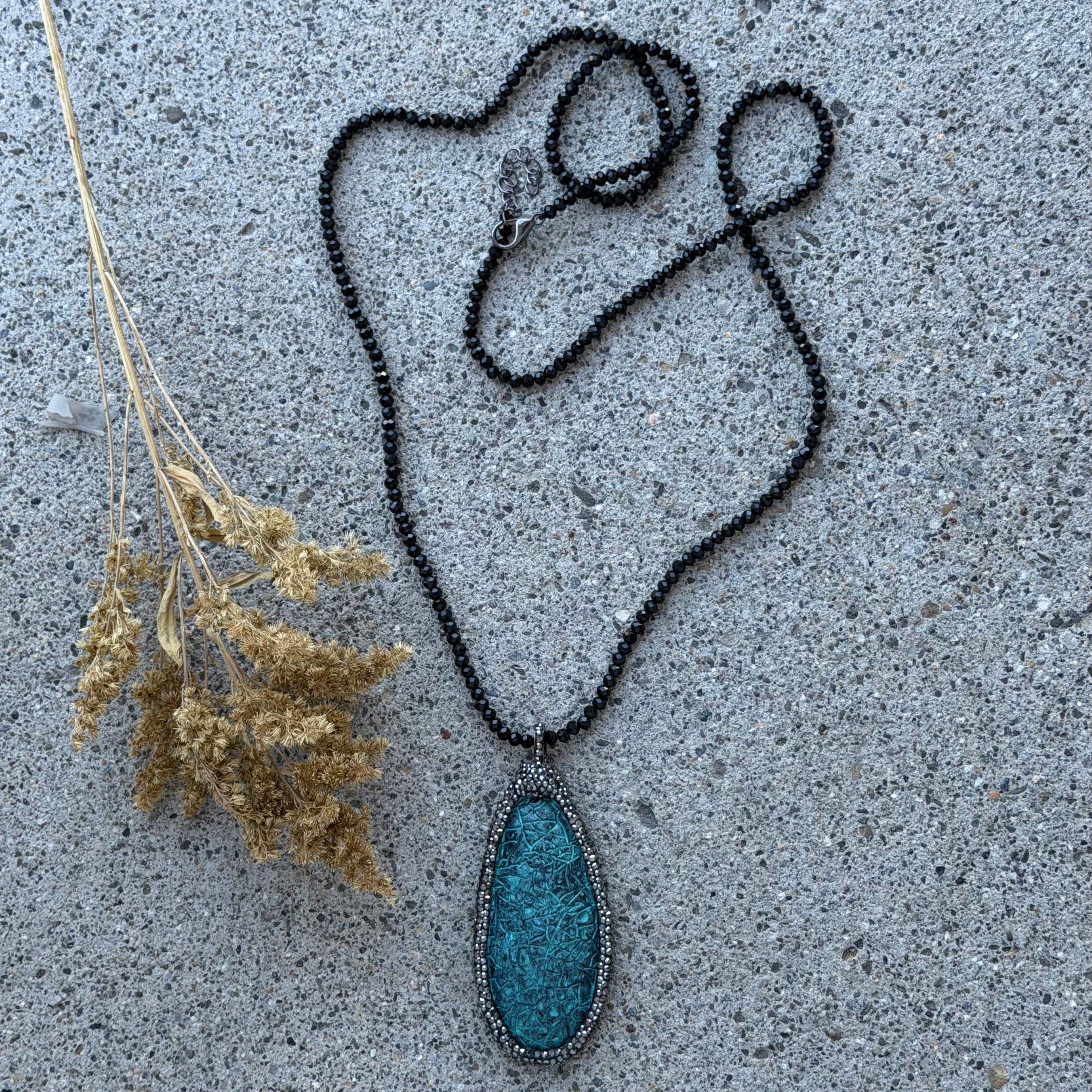 MYSTIC BLUE TIDE BLACK BEADED necklace