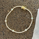GOLD OPAL BAGUETTE CRYSTAL TENNIS bracelet