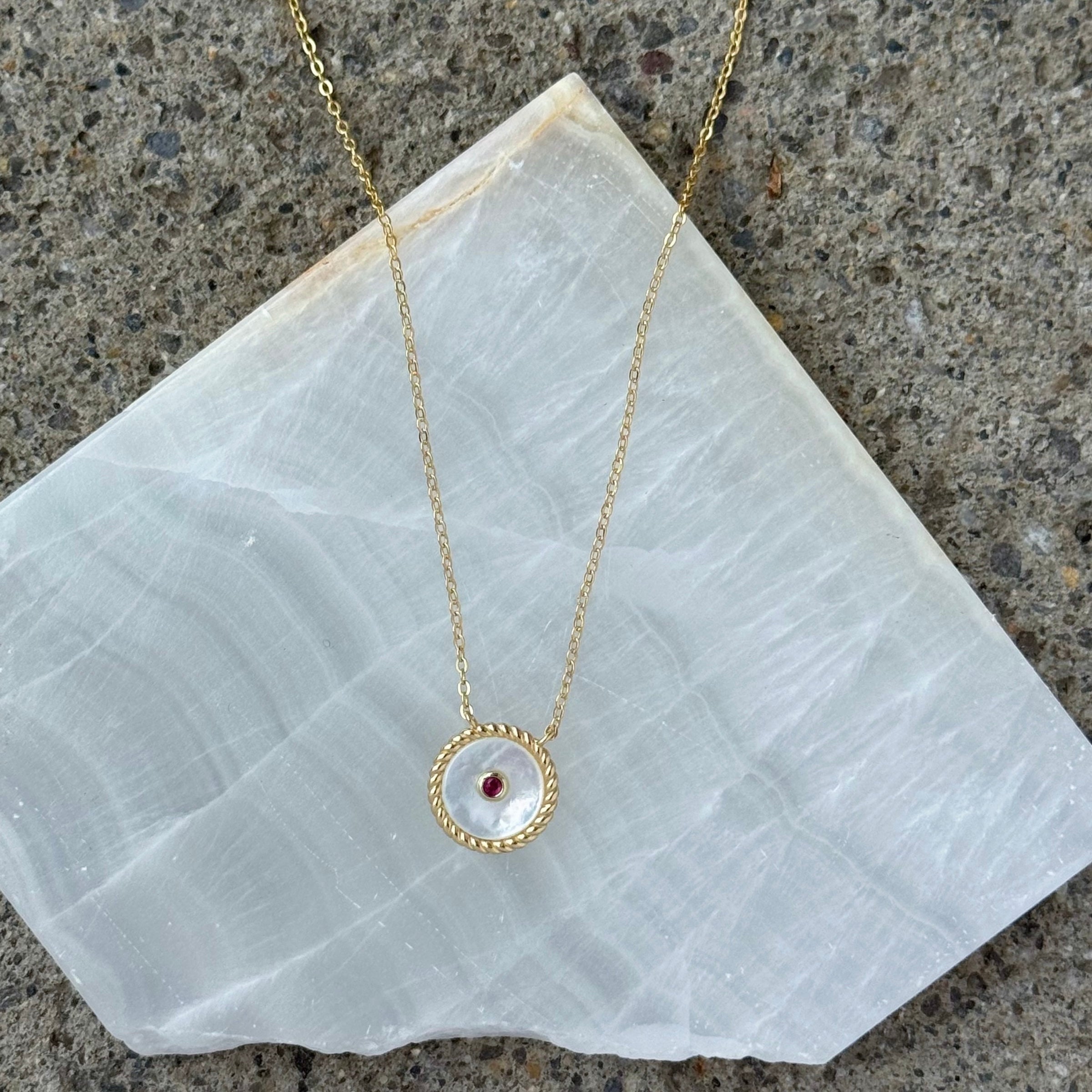 GOLD RUBY CRYSTAL EYE MOTHER OF PEARL necklace