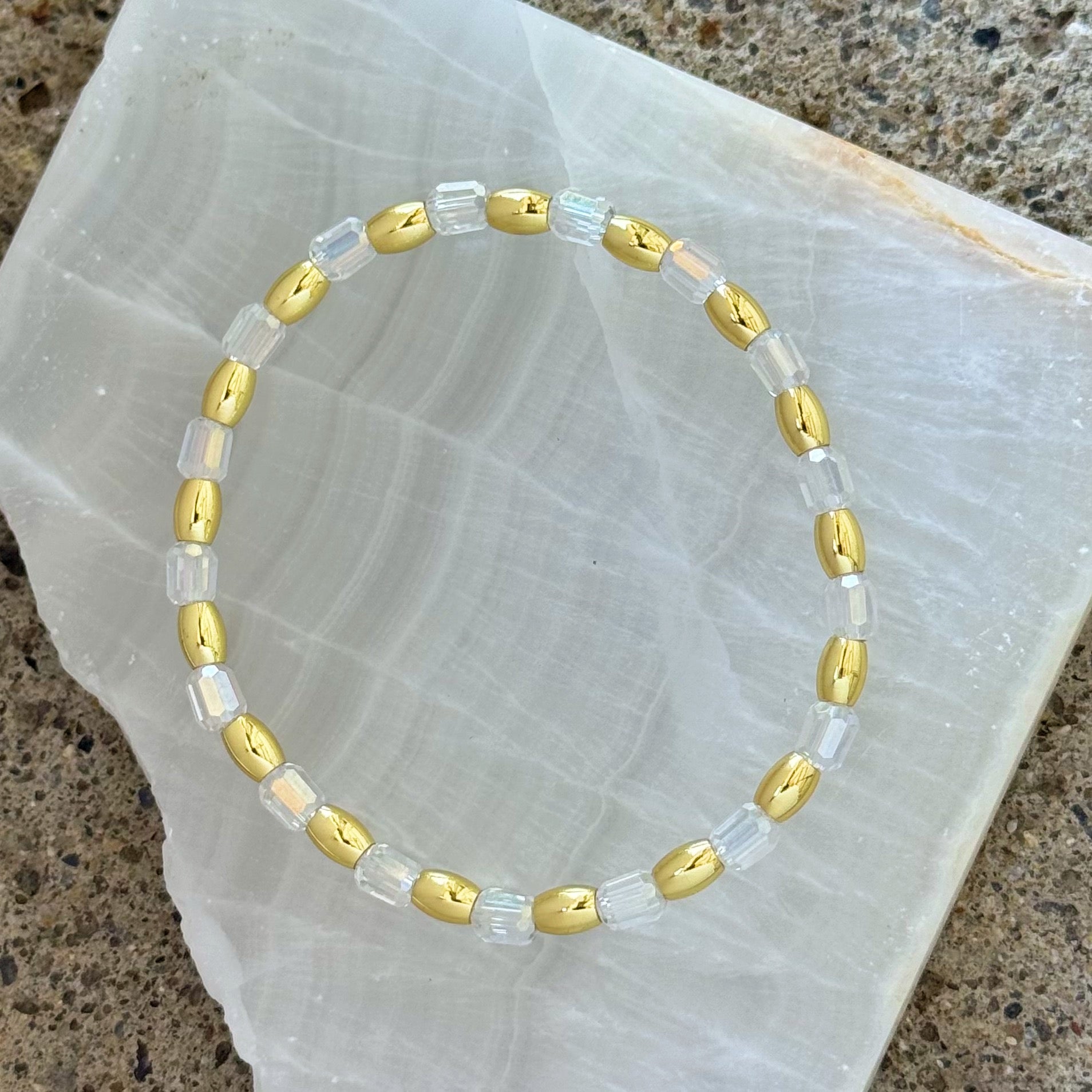 CLEAR RAINBOW QUARTZ GOLD BEADED bracelet