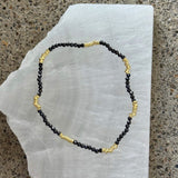 DIAMOND CUT BLACK QUARTZ GOLD BEADED STRETCHY bracelet