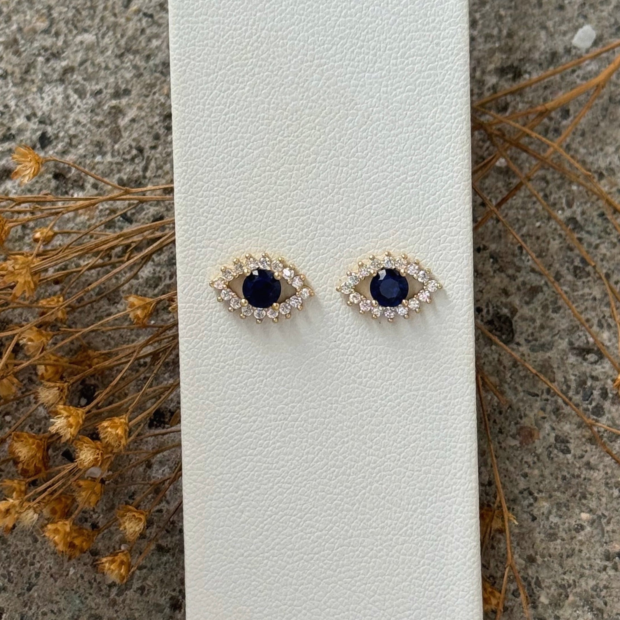 GOLD CRYSTAL SAPPHIRE EVIL EYE STUD earrings