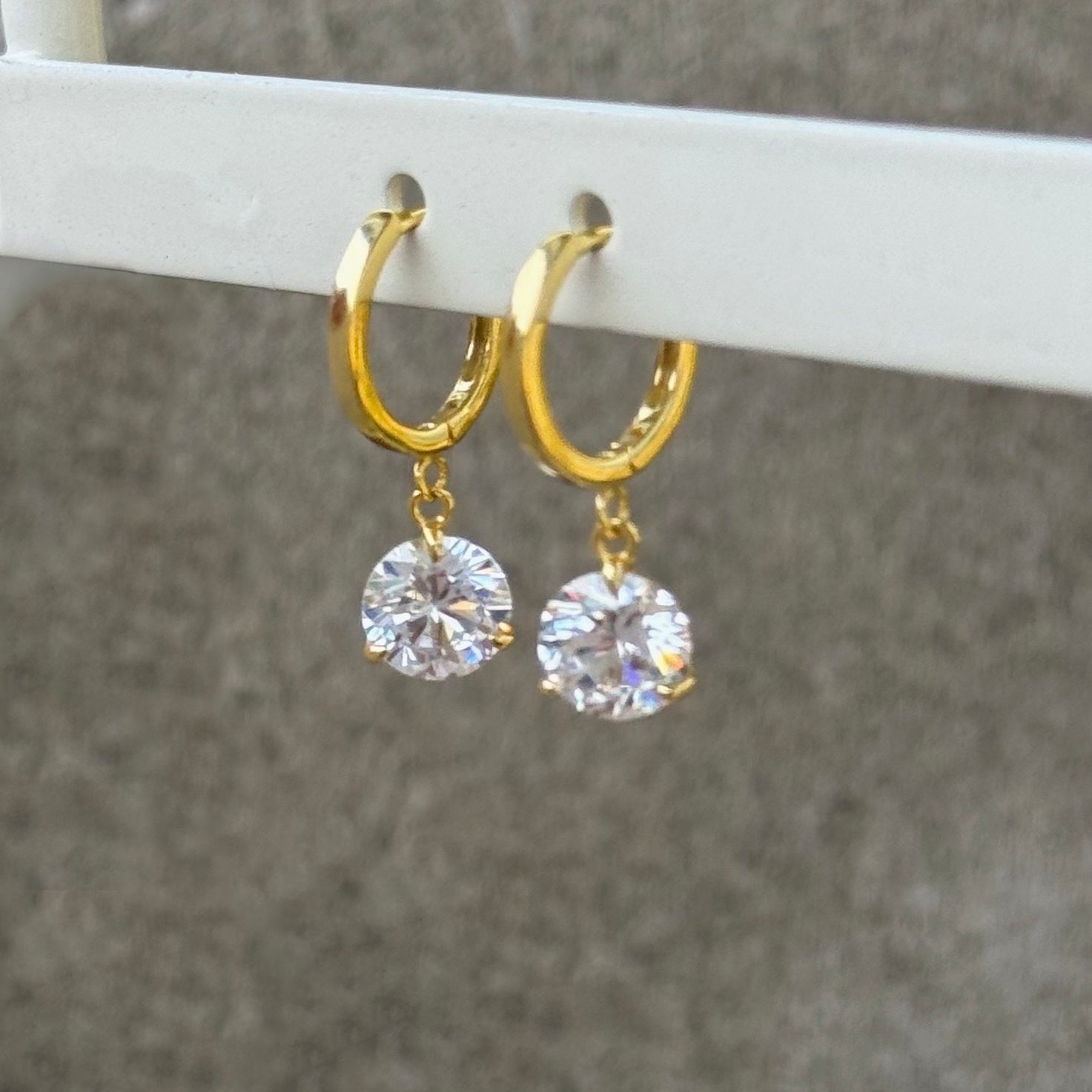 GOLD ROUND CRYSTAL DANGLE HUGGIE earrings