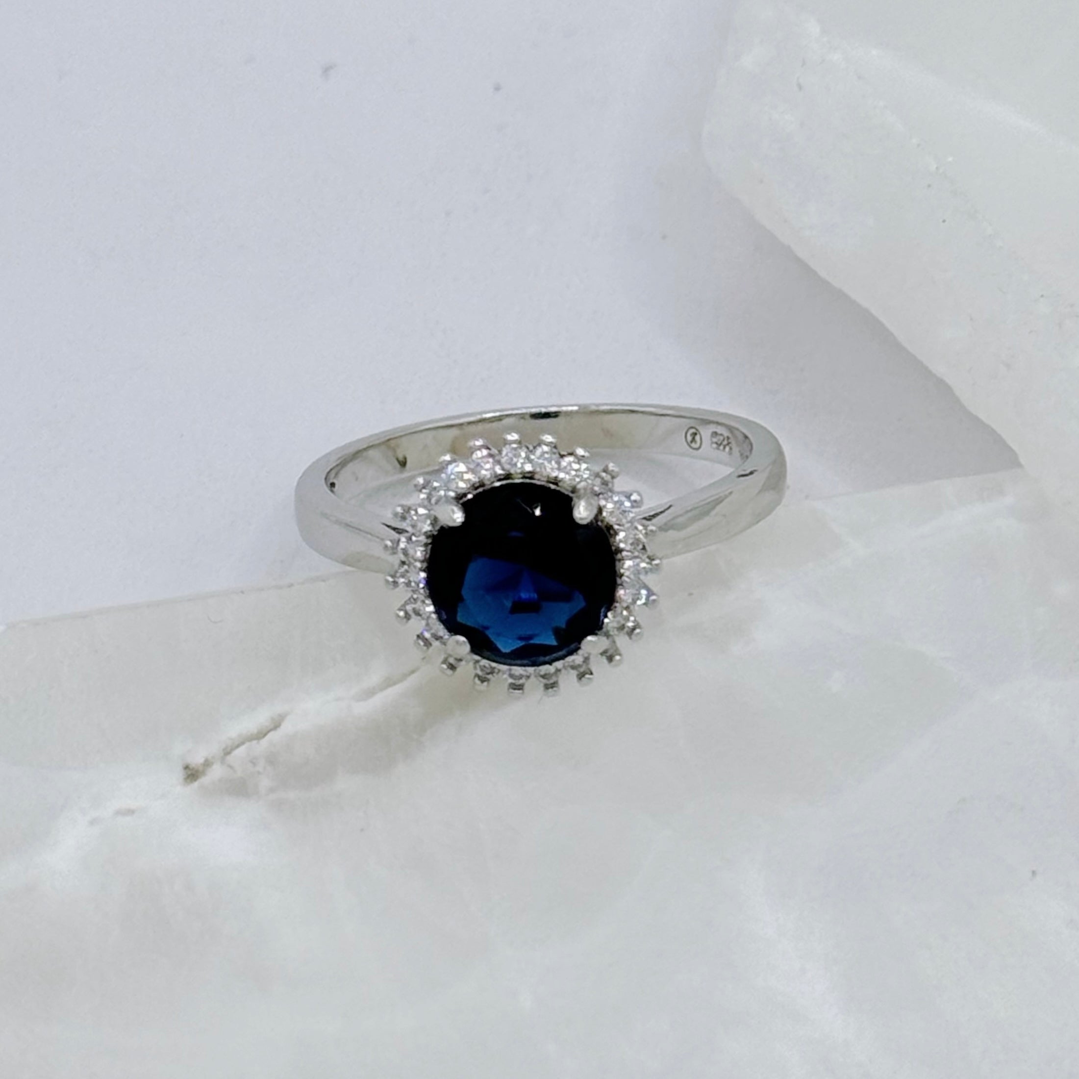ROUND CRYSTAL HALO BLUE SAPPHIRE ring