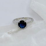 ROUND CRYSTAL HALO BLUE SAPPHIRE ring
