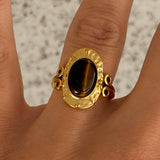 GOLD OVAL TIGERS EYE STEEL ring