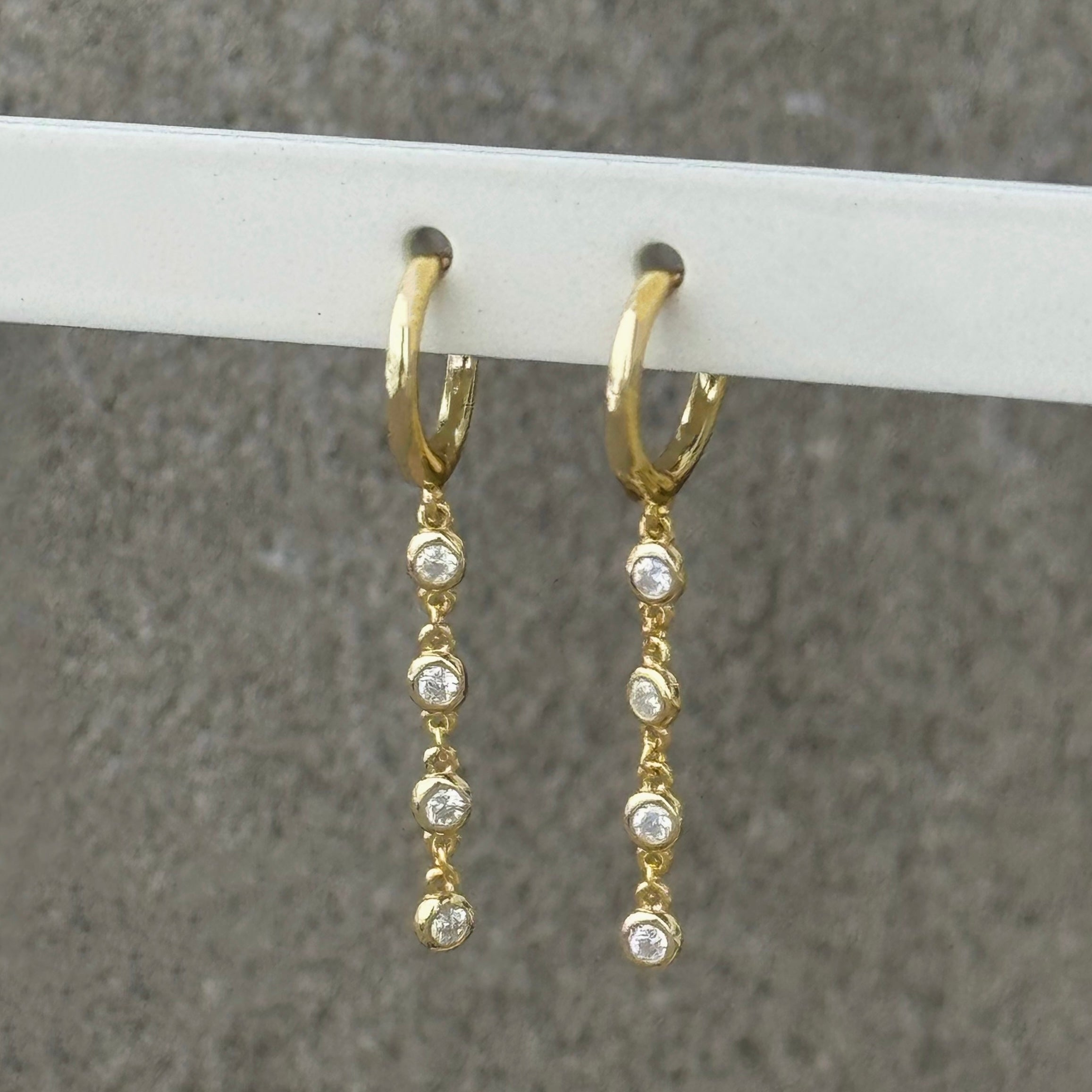 GOLD CRYSTAL BEZEL DANGLE HUGGIE earrings