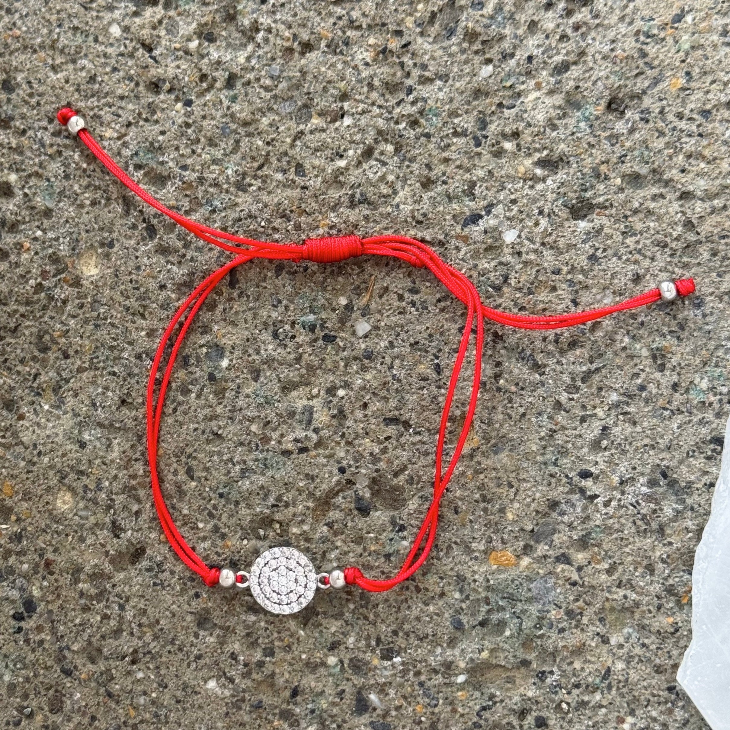 SILVER ROUND PAVE CRYSTAL RED STRING bracelet