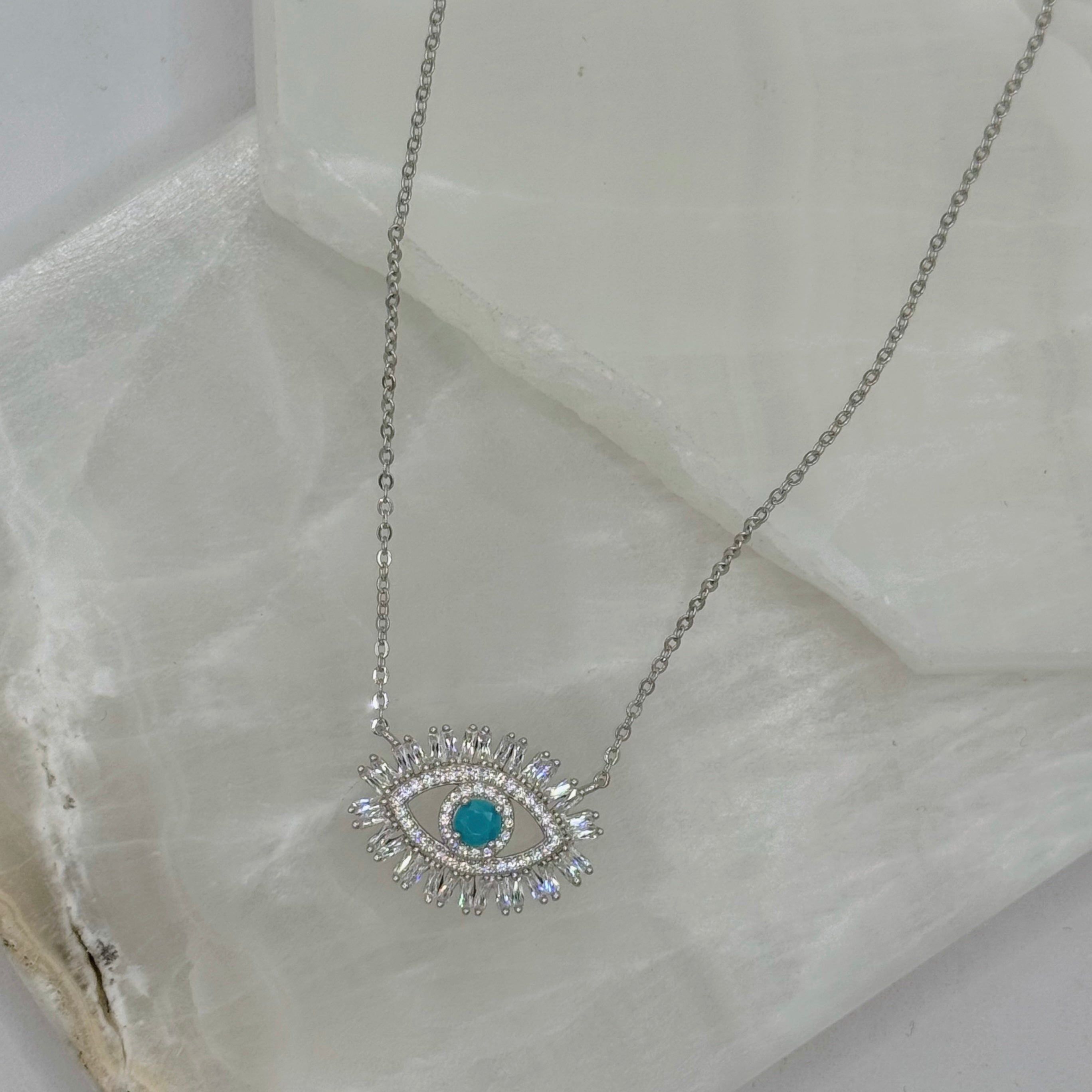 SILVER CRYSTAL BAGUETTE TURQUOISE EVIL EYE necklace