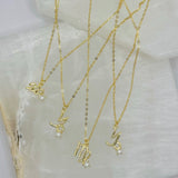 GOLD ZODIAC PEARL MINI necklace
