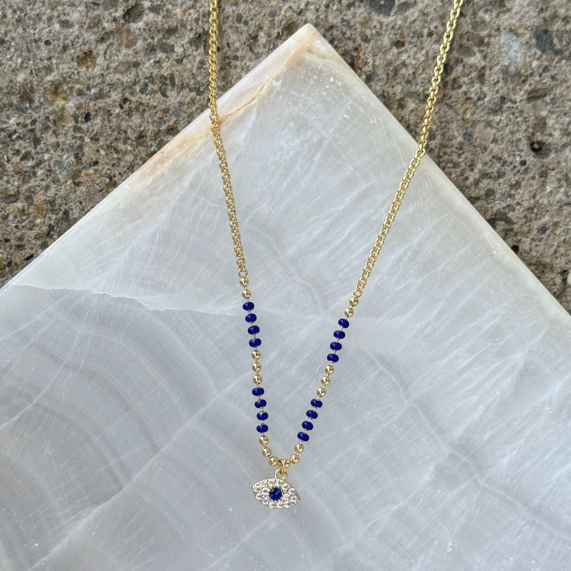 GOLD EVIL EYE II DARK BLUE BEADED necklace