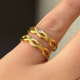 GOLD DOUBLE TWISTED STEEL ring