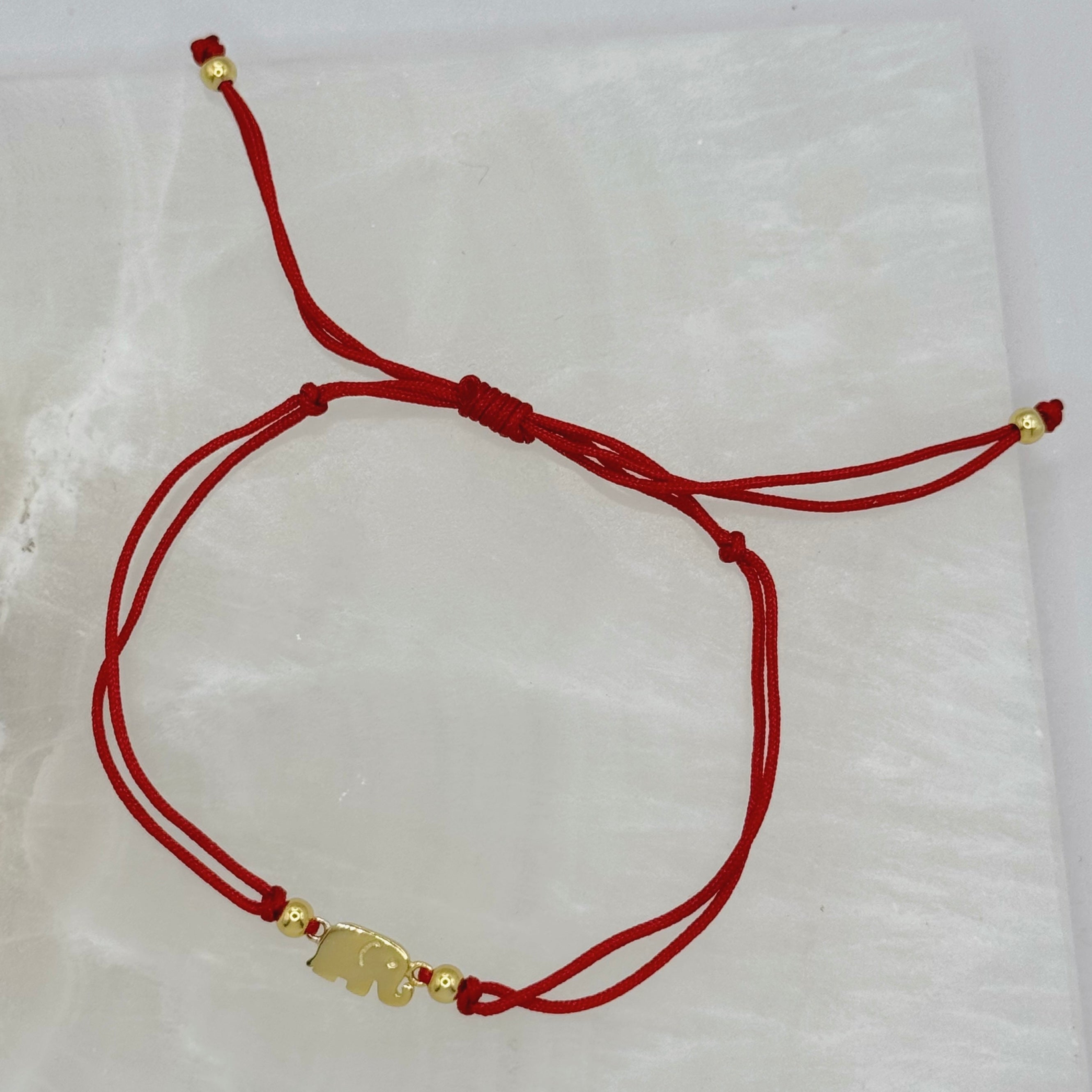 GOLDEN ELEPHANT RED STRING bracelet