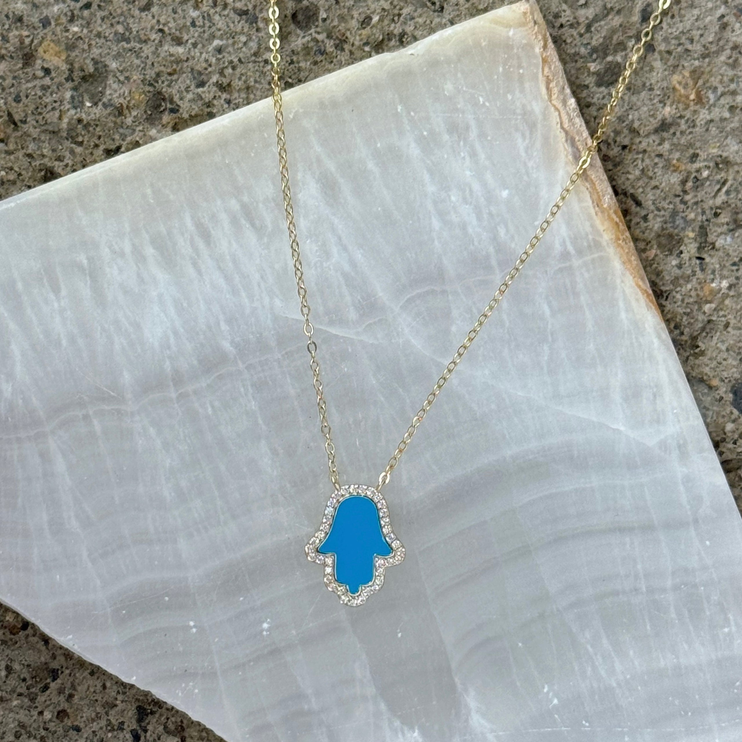 GOLD CRYSTAL SKY BLUE HAMSA necklace