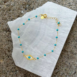 GOLD EVIL EYE TURQUOISE BEADED bracelet