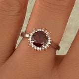 SILVER ROUND CRYSTAL HALO RUBY ring