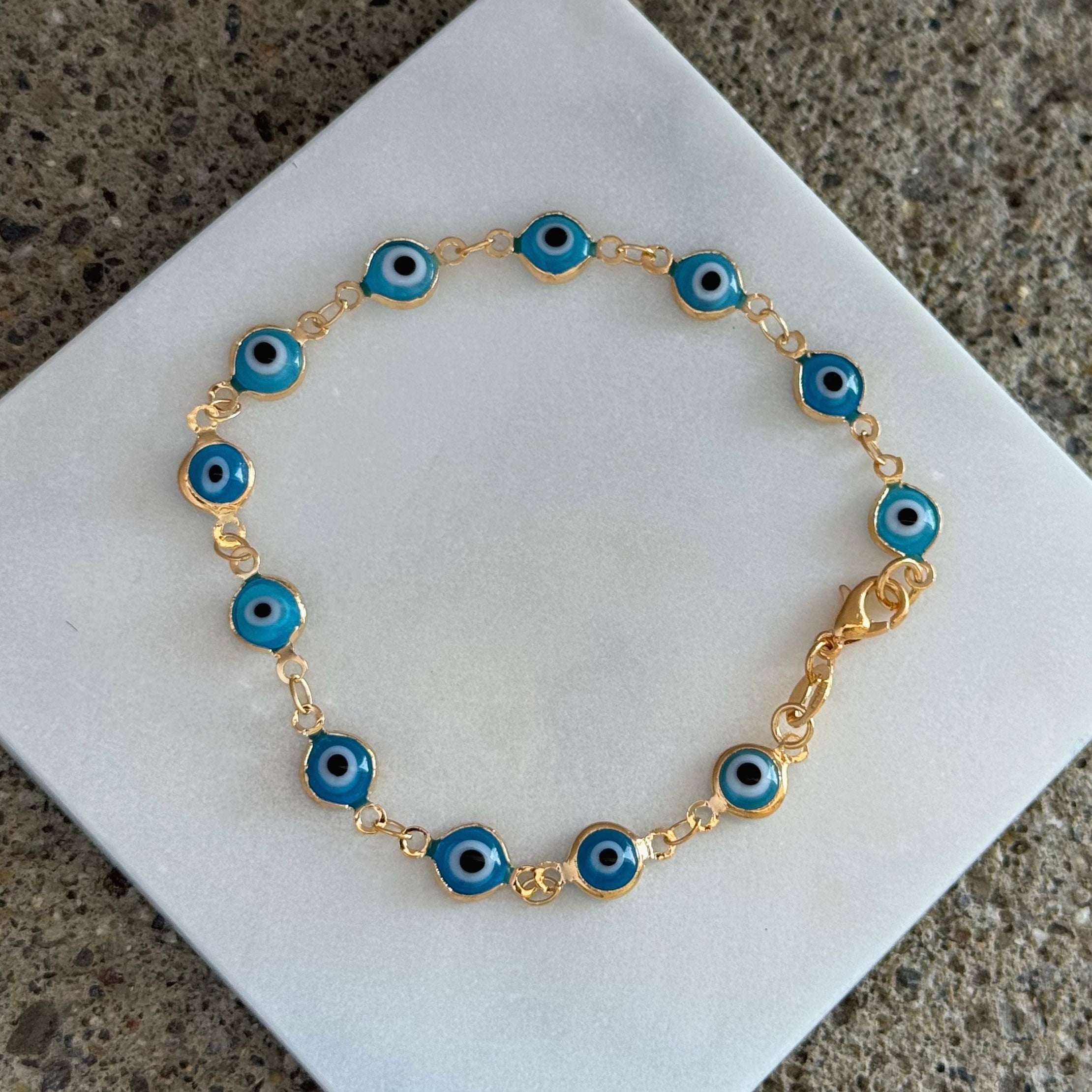 GOLD LIGHT BLUE EVIL EYE bracelet