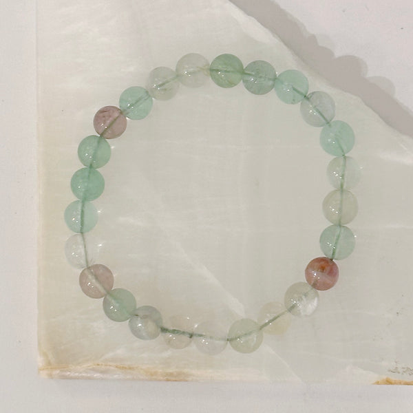 8MM CLEAR GREEN QUARTZ BEADED bracelet