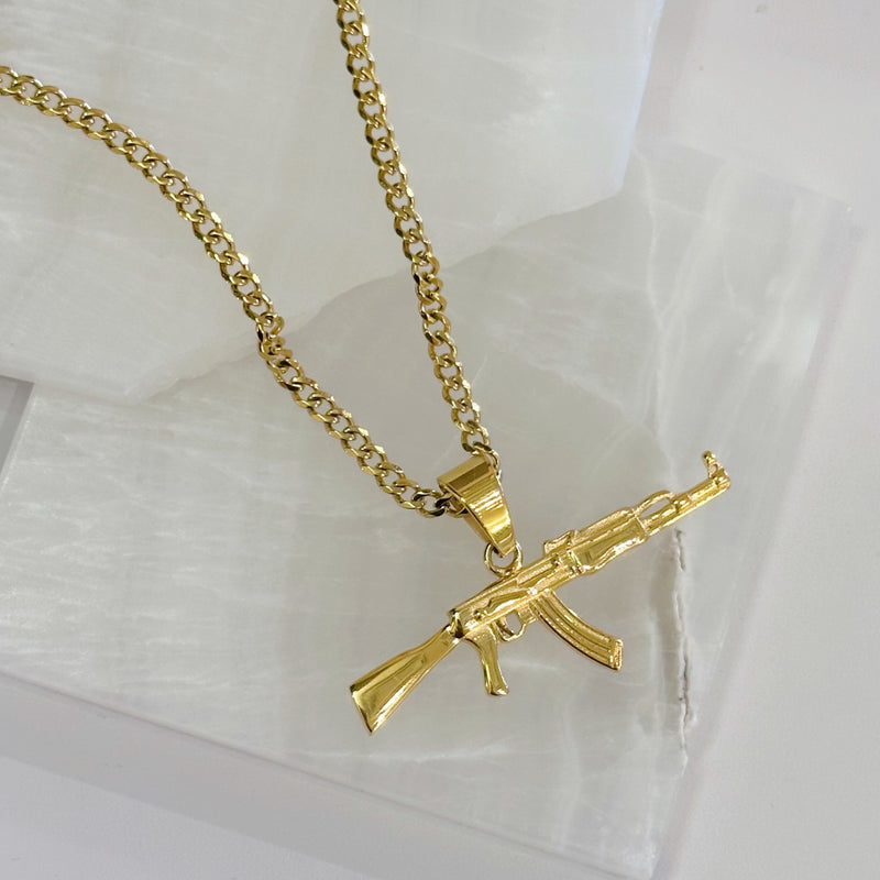 AK-47 necklace diamond studded rifle pendant Gold... - Depop