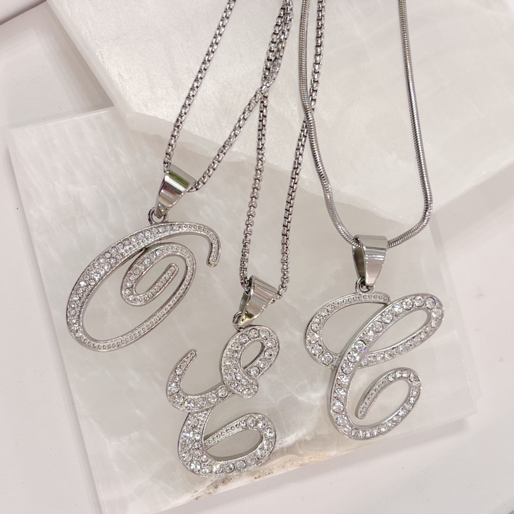 SILVER CURSIVE INITIAL STEEL necklace